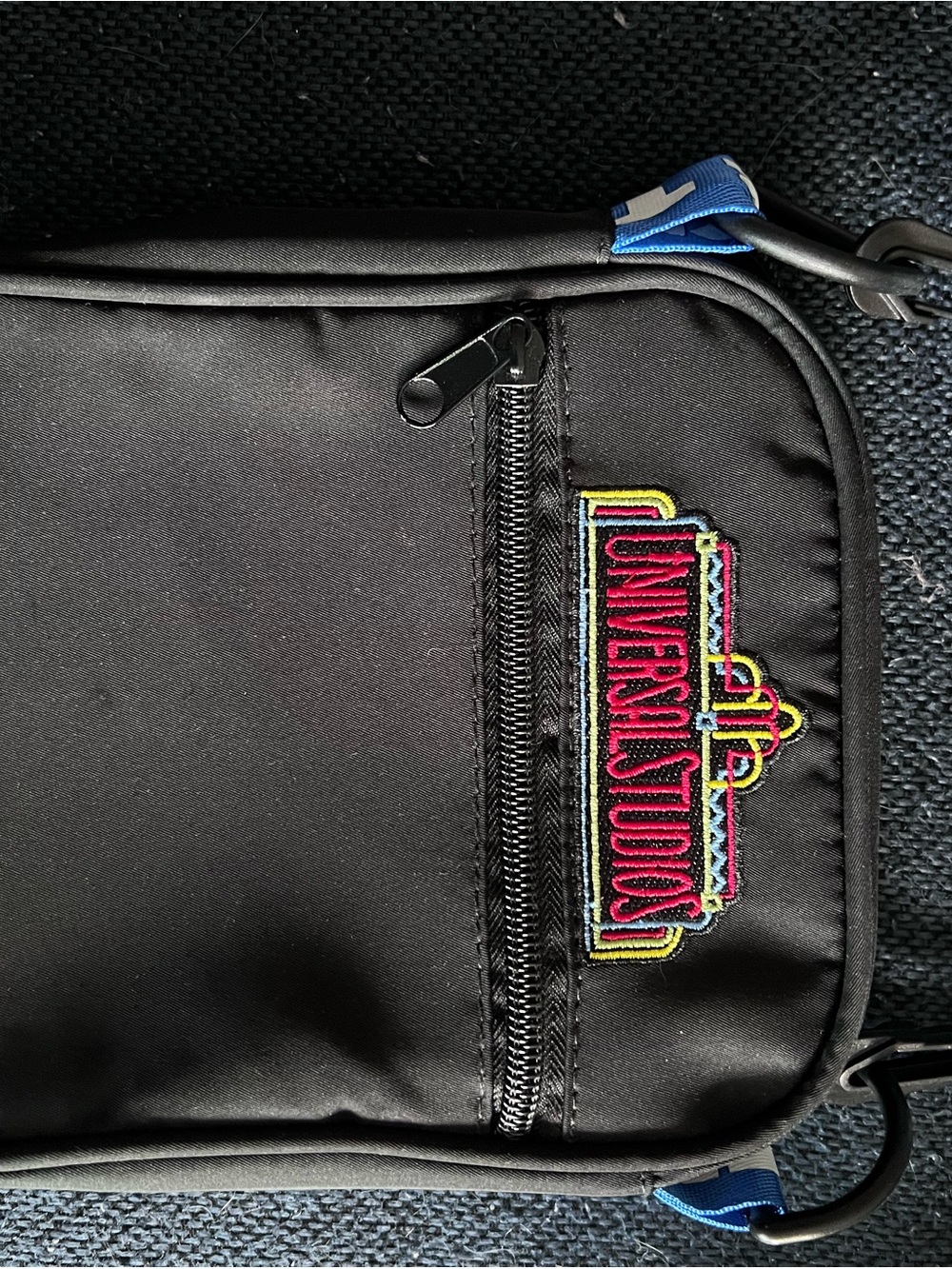Universal Black Crossbody Pouch with Multicolor Universal Studios Patch